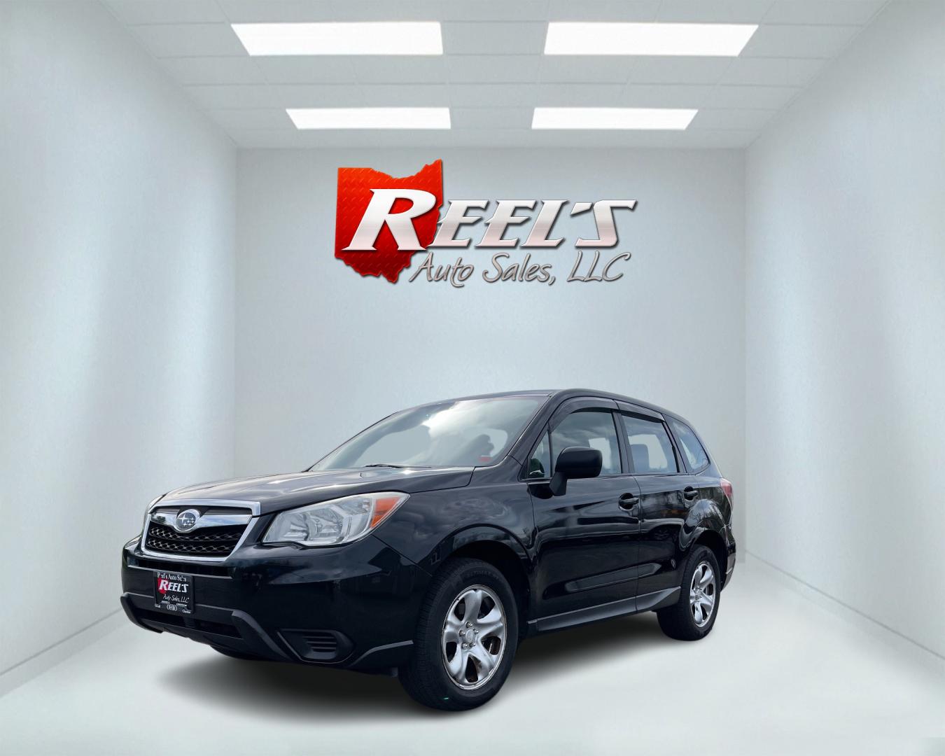 2015 Black /Black Subaru Forester 2.5i (JF2SJAAC1FH) with an 2.5L H4 SOHC 16V engine, Automatic transmission, located at 11115 Chardon Rd. , Chardon, OH, 44024, (440) 214-9705, 41.580246, -81.241943 - Photo#0